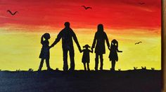 a family silhouetted against an orange, yellow and red sky with birds flying in the background