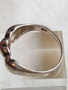 This Rare and Vintage Romantic Signed NF 925 Ring features triple hearts design and is being listed just in time for Valentine's Day. This ring is in a size 7 and is in great vintage condition. The ring will arrive in a ring box with FREE SHIPPING. Please let me know upon purchasing if you would like me to polish it for you. Classic Silver Heart-shaped Ring, Classic Silver Heart Shaped Ring, Classic Silver Heart Promise Ring, Classic Silver Heart Ring Hallmarked, Classic Silver Hallmarked Heart Ring, Vintage Sterling Silver Heart Ring For Valentine's Day, Silver Rings With Hallmarks For Valentine's Day, Vintage Silver Heart Ring For Gift, Vintage Silver Rings For Valentine's Day