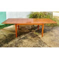 Mid-Century Danish Teak Extendable Dining Table   This table has to be one of my favorites to date! From our private collection, this table has true mid-century charm. A tapered rectangle with rounded edges and beveled veneer work around the perimeter. There are two stowaway butterfly-style leafs that can be stowed below the tabletop. Each leaf opens on a hinge and butterflies open with ease.   Truly meant for a feast, this table extends to 103" long!  Made in Demark stamp found below. Mix of so Mcm Dining Table, Dining Table With Leaf, Butterfly Table, Butterfly Style, Walnut Dining Table, Mid Century Danish, Century Furniture, Extendable Dining Table, Mid Century Furniture