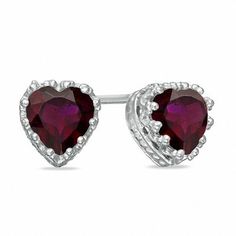 She'll feel like a princess when she wears these charming earrings from the Crown Collection. Designed for the January birthday girl, these earrings are fashioned in sleek sterling silver and showcase stunning 6.0mm heart-shaped regal red garnets in detailed crown-shaped settings. Buffed to a brilliant luster, these post earrings secure comfortably with friction backs. Sterling Silver Heart Cut Birthstone Earrings, Sterling Silver Heart Earrings With Birthstone, Anniversary Birthstone Heart Earrings, Crown Collection, Crown Earrings, January Birthday, Solitaire Studs, Garnet Stone, Stone Heart