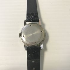 "e643 Vintage Boulevard Swiss Mechanical Stainless Steel Men's Wrist Watch PLEASE READ ENTIRE DESCRIPTION BEFORE PURCHASING Pre-owned vintage item. Please see pictures for details. Some scratches and discoloration. Sold as is, as seen on pictures, no returns on vintage/antique items. We do not alter/polish antique items (unless requested by buyer) and try to keep items as original as possible. Boulevard Mechanical Wrist Watch. Silver Tone Stainless Steel New Leather Band Shock resistant. 17 Jewe Vintage Black Collectible Watch, Vintage Silver Watch With Analog Display, Vintage Analog Watch With Round Dial, Vintage Analog Round Watches, Vintage Silver Business Watch, Silver Vintage Business Watches, Vintage Silver Watches For Business, Vintage Quartz Business Watches, Vintage Silver Watch Accessories For Business