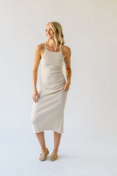 Embrace effortless style with The Aplin Ribbed Tank Midi Dress in Natural. Made with soft ribbed fabric, this dress offers all-day comfort and features a flattering midi length. Perfect for any occasion, this dress is a must-have for your wardrobe. (Score!) Details self/lining: 73% viscose + 27% nylon Fabric Care Guide Here Sizing & Fit Measurements are approximate and taken while laying flat across the front. Not doubled. small: bust = 10"; length = 46" medium: bust = 11"; length = 47" large: b Elegant Ribbed Midi Loungewear Dress, Elegant Ribbed Midi Dress For Loungewear, Fitted Ribbed Midi Dress For Loungewear, White Ribbed Midi-length Sweater Dress, White Ribbed Midi Length Sweater Dress, White Ribbed Knee-length Midi Dress, Elegant Ribbed Midi Dress For Day Out, Sleeveless Ribbed Midi Dress For Loungewear, Sleeveless Ribbed Midi Dress For Daywear