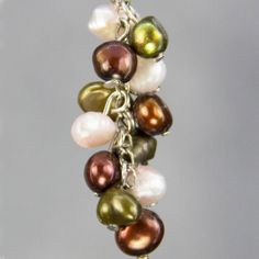 "The colorful dangling chandelier earrings are handmade using fresh water pearl. Perfect gift for any occasion! Free U.S shipping! Anni Designs. A colorful palette could be pastel or vibrant. The pastel color palette is soft and sophisticated, the vibrant color palette is vigorous and infectious. They both could go with many outfits due to the rich mixture of different colors. The length of the earrings is: 1 ¼ inches, or 3.0 cm. (excluding the length of hook) Customers who purchased the earring Elegant Multicolor Dangle Pearl Earrings, Multicolor Pearl Earrings As A Gift, Gift Pearl Charm Dangle Chandelier Earrings, Multicolor Pearl Earrings Set As A Gift, Teardrop Pearl Earrings With Dangling Beads As A Gift, Handmade Pearl Chandelier Earrings Gift, Pearl Chandelier Earrings With Dangling Beads For Gift, Multicolor Pearl Drop Earrings For Gift, Multicolor Handmade Pearl Earrings For Gift