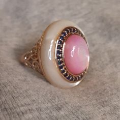 Like New, Gorgeous Barbie Pink And Pristine White Mother Of Pearl Set In A Delicate And Feminine Rose Gold Over Sterling Silver. Invest In Quality,Heirloom Jewelry That You Will Love To Give As A Gift Or Own Yourself . Firm. Elegant Handmade Pink Ring, Elegant Handmade Pink Rings, Elegant Pink Cabochon Rings, White Luxury Sterling Silver Ring, Luxury White Rings Stamped 925, White Rings With Gemstone Accents For Gift, White Rings With Gemstone Accents, Heirloom Jewelry, Heirlooms Jewelry