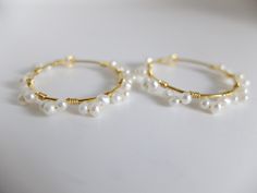 These beautiful fine hoop earrings have beautiful 2 mm freshwater creamy pearls The pearl have a good luster and organic shape They are wire wrapped around gold filled hoops with gold filled wire Diameter of the hoops is 3,00 cm- total diameter is 3,50 cm the pearls are 3 mm Thank you for visiting my shop and if you wish personalized jewels or wish more details, please contact me. I'll be happy to help Thanks for stopping by. See my other handcrafted precious jewels here: http://www.etsy.com/sho Delicate Gold Wire Wrapped Hoop Earrings, Handmade Pearl Yellow Gold Hoop Earrings, Gold Wire Wrapped Pearl Hoop Earrings, Handmade Yellow Gold Pearl Hoop Earrings, Handmade Yellow Gold Hoop Earrings With Pearl, Dainty Wire Wrapped Gold Hoop Earrings, Delicate Gold Hoop Pearl Earrings, Rainbow Gemstones, Quartz Colors