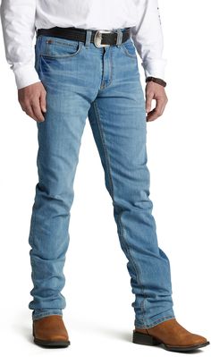 The Justin 1879 J2 Straight Slim Fit denim has a snug fit through the hip and thigh featuring abrasion-resisting denim. They're made with a strong sturdy material that comes in three washes with a tapered boot opening, allowing you to transition from offi Rugged Fitted Straight Leg Jeans, Rugged Fitted Jeans With Five Pockets, Fitted Rugged Jeans In Medium Wash, Rugged Fitted Denim Blue Bottoms, Fitted Rugged Denim Blue Bottoms, Slim Fit Mens Jeans, Justin Boots Men, Justin Boots, Best Western