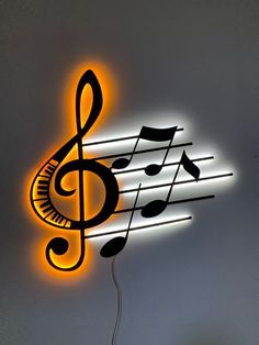 an illuminated music note with musical notes on it