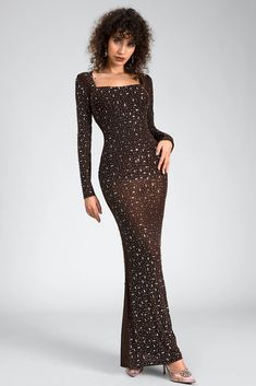 Radiate elegance in our rhinestone sheer mesh dress, a mesmerizing blend of glamour and sophistication. This enchanting garment features intricate rhinestone detailing on sheer fabric, creating an ethereal, shimmering effect that captivates with every movement, making it a standout piece for any special occasion. Handmade customization Fabric composition: 90% polyester fiber, 10% spandex Washing method: hand wash or dry clean Popular elements: rhinestone Red Carpet Affair, Evening Gala, Sheer Mesh Dress, Sheer Maxi Dress, Sparkly Dress, Night Out Dress, Sheer Fabric, Dress Jewelry, Swimwear Sale