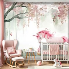 a baby's room decorated in pink and white with an unicorn mural on the wall