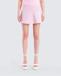 Embrace your flirty side in this pink mini skirt 💕 Made from stretch jersey and complete with a foldover waistband, a picot lace trim on the hem, and an invisible side seam zipper, this mini is the perfect sweet and sassy staple 😌 Stretch Mini Skort With Lined Skirt, Summer Stretch Mini Skirt With Lace Trim, Pink Cotton Skirt With Lace Trim, Casual Pink Skirt With Lace Trim, Pink Lace Trim Mini Skirt, Skirted Stretch Bottoms With Lace Trim, Pink Mini Skirt With Lace Trim, Feminine Stretch Mini Skirt With Ruffles, Feminine Mini Skirt With Lace Trim