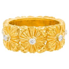 Circa 2000s, 18k, by Buccellati, Italy. Renowned for combining sublime hand-engraved goldwork with contemporary fashion, Buccellati jewelry has energy and originality that is effortlessly chic. With its stylishly fresh look, this band's goldwork is particularly fine (with special note taken of the floral motif). Well-made and in unworn condition, this size 6 1/2 ring is in excellent condition. Remark: "Often copied but never duplicated, Buccellati jewelry is superb. True luxury is owning an orig Buccellati Jewelry, Italy Jewelry, Gold Work, Fresh Look, Flower Ring, Contemporary Fashion, Hand Engraving, Floral Motif, Gold Ring