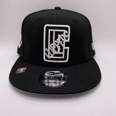 New Era Black La Clippers 2021 Draft Alternate 9fifty Snapback Adjustable Hat. Black Snapback Hat With Flat Crown For Streetwear, Urban Black Baseball Cap With Flat Crown, Black Snapback Hat With Flat Crown For Sports, Black Snapback Hat For Sports Events, Black Sports Hat With Flat Crown, Black Fitted Hat With Flat Crown For Sports Events, Black Flat Crown Fitted Hat For Sports Events, Black Snapback Flat Cap For Sports Events, Black Snapback Flat Cap For Sports