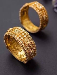 *This is Gold Finish Kundan Bangles Pair.Its Perfect for Wedding Occasion as well as Unique and Ethnic Traditional Bangle to gift and Also Bridal wear to match with Wedding Outfits. *Its made from Silver n Copper mix material and 100% Handmade. *Its available in Various Sizes like 2,2.2,2.4,2.6 Etc Its white kundan combination like shown in picture. *Its open able Screwed Bangles Pair. *All Kundan stones set with silver foils handsetting method and long last guarantee of its workmanship.It is Wh Punjabi Wedding Jewelry, Bracelets Indian, Polki Bangles, Bangles Bridal, Bridal Bracelets, Sabyasachi Jewelry, Wedding Bangles, Indian Wedding Jewelry Sets, Kundan Bangles