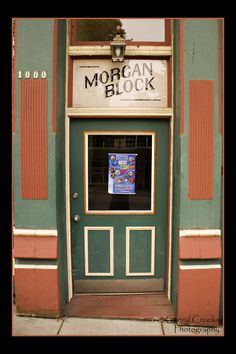 the front door to morgan block with a sign on it