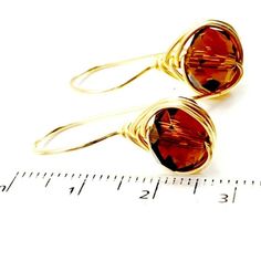 This Amber Brown Crystal Beautiful Earrings with Brown Stone in half embroidery make an excellent finish in these classic earrings They are an excellent option for daily use These classic stud earrings are lightweight for everyday wear. For these beautiful earrings you can choose to make us in any of our wrapped wire: rose gold, silver or gold the one you like best Receive these earrings in a box ready to give to make a detail to your GET FREE SHIPPING!! On Purchases over $35friend mother or sis Brown Oval Earrings As A Gift, Brown Oval Earrings For Gift, Brown Oval Earrings Gift, Brown Teardrop Earrings For Formal Occasions, Formal Brown Teardrop Earrings, Classic Brown Round Earrings, Elegant Brown Crystal Earrings Gift, Elegant Brown Teardrop Earrings For Gift, Elegant Wire Wrapped Amber Earrings