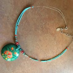 Never Worn Turquoise And Red Beaded Accessorize Necklace! Excellent Condition. Pendant Is Lightweight Wood. Vibrant Blue Round Bead Jewelry, Bohemian Turquoise Hand Painted Jewelry, Turquoise Bohemian Hand Painted Jewelry, Adjustable Vibrant Blue Jewelry, Vibrant Adjustable Blue Jewelry, Blue Turquoise Necklace With Colorful Round Beads, Blue Turquoise Necklace With Colorful Beads, Vibrant Blue Adjustable Jewelry, Blue Round Pendant Necklace For Festivals