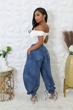 Non-stretch pants High-waisted Elastic waistband Pockets Cuffed ankles Oversized Inseam is 27 inches 75% Cotton 25% Polyester Hand wash cold Model is wearing a small Elegant Streetwear, Streetwear Denim, Bow Women, Denim Cargo, Denim Romper, Denim Maxi Skirt, Active Leggings, Loose Pants, Cargo Trousers