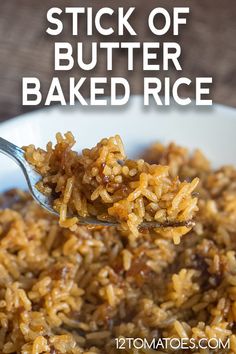 a spoon full of rice with the words stick of butter baked rice above it and below