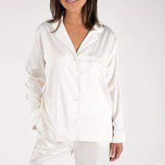 The Birdie Satin Pajamas are certain to become the most refined addition to your loungewear edit. These pajamas are made with luxurious, silky satin that washes beautifully. The button-front top has a notched collar and standard-length sleeves. These are the comfortable, relaxed PJs you’ll live in, gift to everyone, and pack with you wherever you go.Material: Poly-satin fabricSize & Fit: Fits for a more tailored style. Size up if in between sizes. 26.5" InseamCare guide: Machine wash cold with l Luxury Silk Long Sleeve Sleepwear, Luxury Long Sleeve Silk Sleepwear, Elegant Silk Sleepwear With Relaxed Fit, Elegant Modal Satin Sleepwear For Loungewear, White Silk Long-sleeve Sleepwear, White Silk Long Sleeve Sleepwear, Elegant Long Sleeve Sleepwear With Satin Finish, Elegant Long Sleeve Satin Sleepwear, Long Pajamas