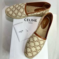 New Celine Les Espadrilles Celine In Triomphe Jacquard Canvas And Calfskin Beige Brown Sz 39 New And Absolutely Stunning Celine Les Espadrilles In Triomphe Patterned Jacquard In Beige/Brown With Caramel Calf Leather Trims And Lining. With Original Box, Dustbags And Cards. Current Style Retailing At $960.00 Plus Tax. Size Italian 39, According To Celine’s Size Guide Us Women’s 9 (*) Details: 100% Cotton 100% Lambskin Lining And Trims 0.2 In (5 Mm) Heel Almond Toe Shape Upper Is Hand-Stitched To T Elegant Beige Slip-on Espadrilles, Chic Beige Espadrilles With Woven Sole, Designer Beige Espadrilles For Summer, Luxury Beige Espadrilles With Woven Sole, Designer Beige Slip-on Espadrilles, Luxury Beige Espadrilles With Flat Heel, Classic Beige Espadrilles With Woven Sole, Classic Beige Slip-on Espadrilles, Designer Beige Flat Heel Espadrilles