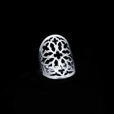 Be enraptured by the mysteries which can be seen through the eye of the cathedral with this Gothic silver rose window statement ring. Get lost in the ornate tracery pattern which is an ode to Medieval architectural marvels and the secrets they conceal. Hand pierced and engraved in sterling silver, the widest part of the ring measures 2.5cm and tapers to 0.3cm at the back for comfort and movement. The ring is custom made to fit, simply select your required size from the dropdown menu. This piece Castle Gothic, Gothic Tracery, October Jewelry, Free Jewellery Making Tutorials, Cathedral Ring, Hand Piercing, Rose Window, Jewelry Post, The Cathedral