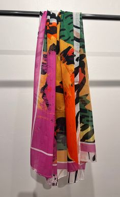 This large square scarf has a multicolored print. It measures 51" x 51" and has a hand sewn hem. 70% Cotton, 30% Silk. Dry Clean Only. Made in Turkey. Multicolor Shawl Scarf For Spring, Multicolor Shawl Scarves For Spring, Multicolor Silk Shawl For Spring, Multicolor Silk Scarf With Abstract Print For Spring, Multicolor Cotton Shawl Scarf, Bohemian Multicolor Scarf With Abstract Print, Multicolor Silk Scarf With Abstract Print, Bohemian Multicolor Scarves With Abstract Print, Multicolor Silk Scarves With Abstract Print