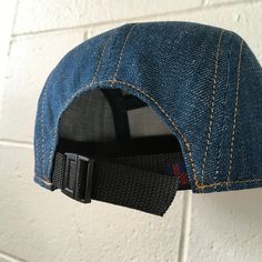 "Handmade cap with pencil holder✏️ ✎DETAILS: 5 panel cap is handmade from 10 oz indigo denim ( made in USA). Sewn with golden heavy duty top stitch thread. Patch, brim and hardware made in the USA. The brim is not a bought plastic insert. Brims are handmade here in house, they are shorter and softer than typical hats. They are super comfortable yet still completely hand washable and incredible durable. Hand built by two human makers ( apes/April & bird/Rich) with love, care and pride here in Casual Everyday Cap, Everyday Denim Hats One Size Fits Most, Denim Blue Adjustable Snapback Hat, Casual Adjustable Hats, Adjustable Denim Trucker Hat Snapback, Adjustable Denim Snapback Trucker Hat, Adjustable Denim Baseball Cap With Flat Bill, Adjustable Snapback Hats For Everyday Use, Monogram Baseball Hat