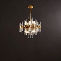 This classic brass chandelier features a unique design that includes clear glass rods for a unique look. Perfect for a formal dining area, the brass adds a touch of classic elegance and the glass rods create an element of light and texture to the space. STANDARD SIZE 8heads Size: Dia 48cm x H 60cm / ∅ 18.9″ x H 23.6″ 10heads Size: Dia 62cm x H 60cm / ∅ 24.4″ x H 23.6″ 12heads Size: Dia 72cm x H 60cm / ∅ 28.4″ x H 23.6″ 16heads Size: Dia 80cm x H 60cm / ∅ 31.5″ x H 23.6″ FEATURES Materials: Brass Antique Brass Pendant Light, Antique Brass Chandelier, Lustre Vintage, Grand Hall, Starburst Design, Suspension Vintage, Brass Pendant Light, 3d Modelle, Mode Design