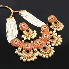 This is a stunning handmade choker necklace perfect for high end Jewelry Collector, a keeper in Traditional Vintage Indian/Pakistani Bridal jewelry and a Luxury Gift for your Daughter, Sister or Wife on Wedding or Anniversary. Perfect for any type of occasions, weddings And celebrations and a beautiful & memorable gift for weddings and special occasions. Description  Item Code:- L Gold Plated Fine Kundan & Pearl Cluster Choker Necklace Necklace Measures- Adjustable with a Dori/Cord Earring Measures- 62x45mm approx Quantity- One Necklace Set Please see more different designs here:- https://www.etsy.com/in-en/shop/LUCKYJEWELSART?ref=seller-platform-mcnav I make every item of my collection with a lot of love and care, I pay attention to every detail.  You are more than welcome to contact me f Luxury Heavy Kundan Necklace For Navratri, Luxury Pearl Kundan Necklace For Celebrations, Luxury Kundan Necklace For Navratri Ceremonies, Luxury Festive Choker Temple Necklace, Luxury Kundan Temple Jewelry Necklace For Navratri, Luxury Pearl Necklace With Meenakari, Luxury Necklace For Navratri Celebration, Luxury White Necklace With Meenakari, Luxury White Meenakari Necklace