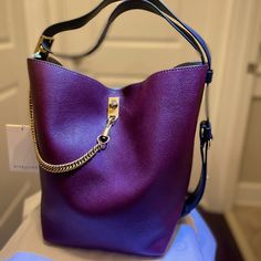 Givenchy Aubergine Medium Bucket Bag. Nwt. Beautiful Bucket Bag. My Husband Bought For Me Two Years Ago And Never Had The Heart To Say It Wasn’t Exactly My Style. It’s A Beautiful Fancy But Casual Bag. Please Message Me With Questions. Purple Bucket Shoulder Bag With Detachable Strap, Purple Top Handle Shoulder Bag With Gold-tone Hardware, Luxury Purple Shoulder Bag With Detachable Handle, Elegant Purple Pouch Shoulder Bag, Luxury Purple Shoulder Bag With Gold-tone Hardware, Purple Evening Bags With Removable Pouch, Purple Shoulder Bag With Detachable Handle For Evening, Purple Evening Shoulder Bag With Detachable Handle, Evening Purple Shoulder Bag With Detachable Handle