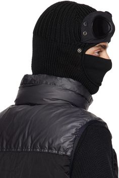 Knit extrafine merino wool and nylon taffeta balaclava in black. · Press-stud panel with acetate lenses at face · Logo flag and rolled edge at collar Face masks and face coverings are final sale and are not eligible for return or exchange. Supplier color: Black Black Full Face Balaclava For Cold Weather, Black Windproof Full Face Balaclava, Black Balaclava For Cold Weather, Black Balaclava For Skiing In Winter, Black Skiing Balaclava For Winter, Black Winter Skiing Balaclava, Face Logo, C P Company, Face Coverings