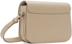 Buffed leather shoulder bag in beige. · Adjustable post-stud shoulder strap · Logo embossed at face · Tab-slot foldover flap · Three-compartment interior · Partial suede lining · Partial cotton twill lining · Silver-tone hardware · H5.75 x W8 x D2 Supplier color: Beige Small Bag, A P, Cotton Twill, Leather Shoulder Bag, The Face, Silver Tone, Shoulder Strap, Shoulder Bag, Leather