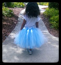 This is a fun tutu skirt for little ones to wear! Blue, light blue, and white tulle are attached to a crochet waist for a beautiful and comfortable fit. Two white satin ribbon bows are attached on the front of the skirt, while a light blue satin ribbon bow adorns the back of the tutu. This tutu is very versatile, it can be used as part of a costume, dress up, birthdays, or worn to a special occasion. The blouse is not included. Please message me any questions you may have. I have many colors ava Blue Princess Tutu Dress With Bow, Princess Style Blue Tutu Dress With Bow, Cute Blue Party Skirt, Frozen Blue, Pink Tulle Skirt, Morgan Hill, Girls Skirts, Princess Tutu, Satin Ribbon Bow