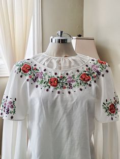 Vintage embroidered floral blouse top  cotton it will fit   S  measures are: Shoulder to shoulder:16inches Sleeves 22 inches Bust 38nches Length:25nches  .Excellent condition White Long Sleeve Blouse With Floral Applique, White Cotton Peasant Top With Embroidered Neckline, Spring White Blouse With Floral Applique, White Floral Applique Blouse For Spring, White Blouse With Floral Applique For Spring, White Cotton Peasant Top With Embroidered Sleeves, White Fitted Blouse With Floral Embroidery, Spring White Blouse With Embroidered Neckline, Fitted White Blouse With Floral Embroidery