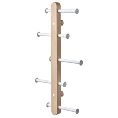 a wooden coat rack with four white rods and two grey knobs on each end