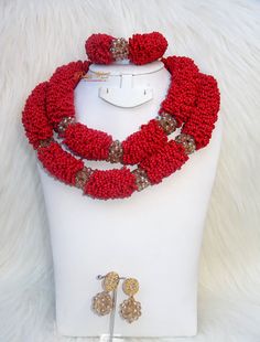 2 Layers New Latest Design African Red Beads Bridal Wedding Jewelry Necklace Set Beads can be customised to your specification and color Comes with Necklace, earring and bracelet Necklace: 2 layers Bracelet: 1 Layers Red Polished Beads Jewelry Sets, Elegant Red Beads For Wedding, Red Jewelry Sets With Polished Round Beads, Elegant Red Beaded Bridal Necklace, Elegant Red Bridal Necklace With Round Beads, Red Wedding Jewelry Sets With Round Beads, Red Bridal Necklace With Faceted Round Beads, Traditional Red Jewelry Sets With Colorful Beads, Red Round Beads Bridal Necklace For Party