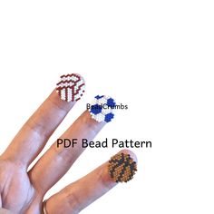 a person's hand with beaded rings on it and the words pdf bead pattern