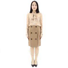 Luxuriously soft Burberry skirt combines premium wool, cashmere and delicate detailing. Warm camel hue flatters all. Detachable buttoned panel added flair for every occasion whether brunch or event. Comfortable A-line silhouette falls at knee for effortless style. Wear with boots now, sandals as temps rise. Investment piece you'll reach for season after season. Elegant Mini Skirt With Button Closure For Office, Elegant Office Mini Skirt With Button Closure, Elegant Button-up Office Skirt, Chic Office Mini Skirt With Buttons, Buttoned Skirt For Office In Fall, Chic Buttoned Skirt For Workwear, Fall Office Skirt With Button Closure, Fall Office Skirt With Buttons, Chic Workwear Skirt With Buttons