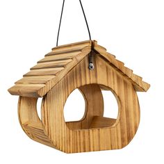 a wooden bird house hanging from a string