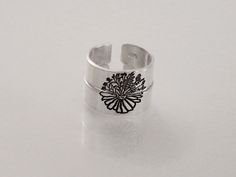 This two-ring set features one ring with a half daisy and the other half with a bunch of wildflowers. The perfect two-ring set for everyday wear for your best friend, partner, or sibling. This unique design is great for everyday wear. Product Details: Materials: Aluminum, Sterling Silver, Fine Silver, 14k Gold Filled Color: Silver, Gold, Rose Gold Size: 6mm Two Matching Rings You will receive two hand-stamped rings filled with a black enamel finish. Adjustable Flower Ring For Everyday Wear, Matching Ring Set, Hand Stamped Ring, Stamped Rings, For Your Best Friend, Matching Ring, The Other Half, Other Half, Matching Rings