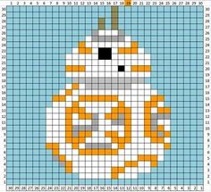 a cross stitch pattern with an orange and white object in the shape of a robot