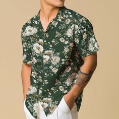 Introducing our Hawaiian Shirt for men, featuring vibrant floral patterns and a comfortable button-up design, perfect for the travel-loving boho enthusiast. This retro vacation wear blends style and comfort effortlessly, making it an ideal casual button-down choice for those seeking laid-back charm with a touch of nostalgia. 𝐃𝐄𝐓𝐀𝐈𝐋𝐒 🌼95% Polyester | 5% Spandex 🌼Boxy fit, straight cut 🌼Runs large, check your measurements against size chart 🌼Includes Chest Pocket 🌼Colors may appear dif Floral Dress Shirt Men Outfit, Green Hawaiian Button-up Shirt, Spring Green Camp Shirt With Floral Print, Green Floral Print Camp Shirt For Spring, Collared Cotton Hawaiian Shirt With Floral Print, Cotton Collared Hawaiian Shirt With Floral Print, Casual Camp Shirt With Floral Print And Camp Collar, Casual Camp Shirt With Floral Print, Green Floral Print Hawaiian Shirt For Summer