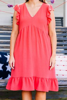 Experience the ultimate summer romance in our Sunset Serenade Dress! Made with air flow material for a lightweight and breezy feel, it features flutter sleeves and a flounce hemline for a flowy and feminine look! The babydoll silhouette adds a touch of playfulness to this dress! Fall in love with every wear! 100% Polyester V-neck Ruffle Hem Sundress, Breezy V-neck Dress With Ruffles, Feminine V-neck Tiered Summer Dress, Beach Dress With Ruffle Hem And Flutter Sleeves, Breezy V-neck Dress With Ruffle Hem, Flowy Summer Tiered Dress For Day Out, Flowy Tiered Summer Dress For Day Out, Flowy Tiered Dress For A Summer Day Out, V-neck Tiered Dress With Ruffle Hem For Beach