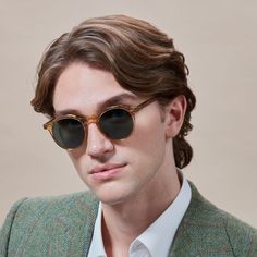 Sunglasses Unisex TBD Eyewear Lapel Eco Honey | Bottle Green. Contemporary elegance is highlighted by the round frame with a slight square on the brow. Declined in honey tones and combined with green lenses, it is made from bioacetate plates with bio-based lenses. Lens: 100% UV protection. Filter: Category 3 Classic Wayfarer Sunglasses For Spring, Classic Sunglasses With Uv Protection For Spring, Modern Beige Sunglasses For Formal Occasions, Elegant Round Frame Formal Sunglasses, Elegant Formal Round Frame Sunglasses, Elegant Business Sunglasses With Tinted Lenses, Elegant Sunglasses With Uv Protection And Round Frame, Elegant Round Frame Sunglasses With Uv Protection, Classic Brown Sunglasses For Spring