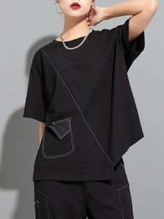 Irregular Black Tops For Spring, Black Asymmetrical Cotton Top, Black Irregular Top For Spring, Black Asymmetrical T-shirt For Spring, Black Asymmetrical Hem Top For Spring, Black Asymmetrical Top For Work, Black Asymmetrical Hem T-shirt For Summer, Black Asymmetrical Hem Top For Work, Black Summer T-shirt With Asymmetrical Hem