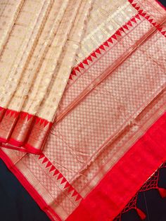 Gorgeous Semi Banarasi Silk Saree in Beige and Red Color combination. The Saree is dyeable. Item : SareeColor : Beige and Red Base Fabric : Semi Banarasi Silk Blouse piece : YesBlouse material : Banarasi Georgette Silk Work : Handloom with Zari weavingFall & Edging(Pico) Yes/No : YesDisclaimer -:- Color variation is possible due to various reasons like phone or desktop setting, resolution etc. Please don't hold us responsible. Our aim is to put the exact color of the Saree.- If the Saree is Pure Red Color Combinations, Silk Saree Banarasi, Party Wear Saree, Banarasi Silk Saree, Readymade Blouse, Wear Saree, Blouse Material, Soft Silk Sarees, Banarasi Sarees