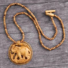 Hand Crafted Wood Necklace Indian Jewelry - Elephant Fortune | NOVICA #india #travel #supportartisans #supporthandmade #alwayshandmade #empower #explore #novica Dancing Pendant, Wood Jewelery, Elephant Pendant Necklace, Necklace Indian, Wood Necklace, Modern Necklaces, Wood Pendant, Hand Crafted Gifts, Handcrafted Wood