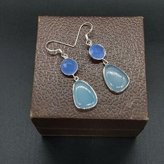 NOTE : WE USED NATURAL GEMSTONES , SO STONE  MAY BE LITTLE DIFFERENT .Here is a listing of Aqua Quartz Sterling Silver Earrings About Product :- # Title - Silver Earrings # Material - Sterling Silver 925 # Stone - Blue calcy it will look very beautiful when you wear in party and special occasion ..It is A special gift for your loved once ...Note -Please see all images for more details . Thanks for visiting our shop. Favorite our shop for daily updates .. Blue Bohemian Sterling Silver Earrings, Dainty Blue Drop Earrings, Elegant Chalcedony Earrings With Natural Stones, Handmade Chalcedony Earrings For Gifts, Handmade Chalcedony Earrings As Gift, Handmade Chalcedony Jewelry Gift, Blue Chalcedony Jewelry With Natural Stones, Bohemian Sterling Silver Gemstone Earrings, Light Blue Sterling Silver Dangle Earrings