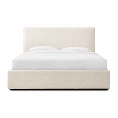 a bed with white linens and pillows on top of the headboard, in front of a white background