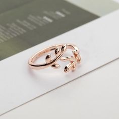 Wrap your finger in elegance with this laurel leaf ring. This ring is adjustable so you can wear it as a regular ring or midi ring! Metals Type: Zinc Alloy.Surface Width: 2.5 mm | 0.10 inch.Weight: 10 g | 0.35 oz.Size: Adjustable. Available in Gold, Silver and Rose Gold.*NOTE: Due to the Chinese New Year Holiday, this item will ship by the end of February 2021. Guaranteed safe checkout:PAYPAL | VISA | MASTERCARD Please allow 9 - 24 business days for the item to arrive. Mid Rings, Hip Hop Rings, Trendy Rings, Ring Settings Types, Rings Jewelry Fashion, Wedding Party Jewelry, Ring Shapes, Vintage Gothic, Finger Rings